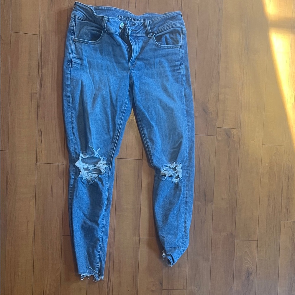American Eagle Outfitters Women's Ripped Blue Super Low-Rise Jeggings